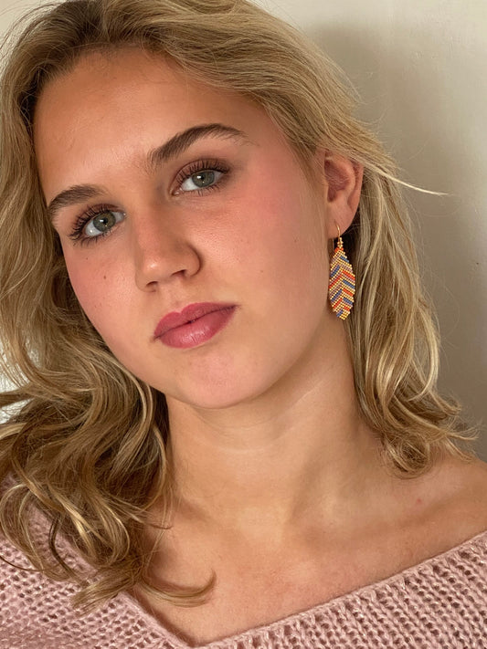 #271 Blade Orange/himmelblå/creme/orchid/guld ørekroge